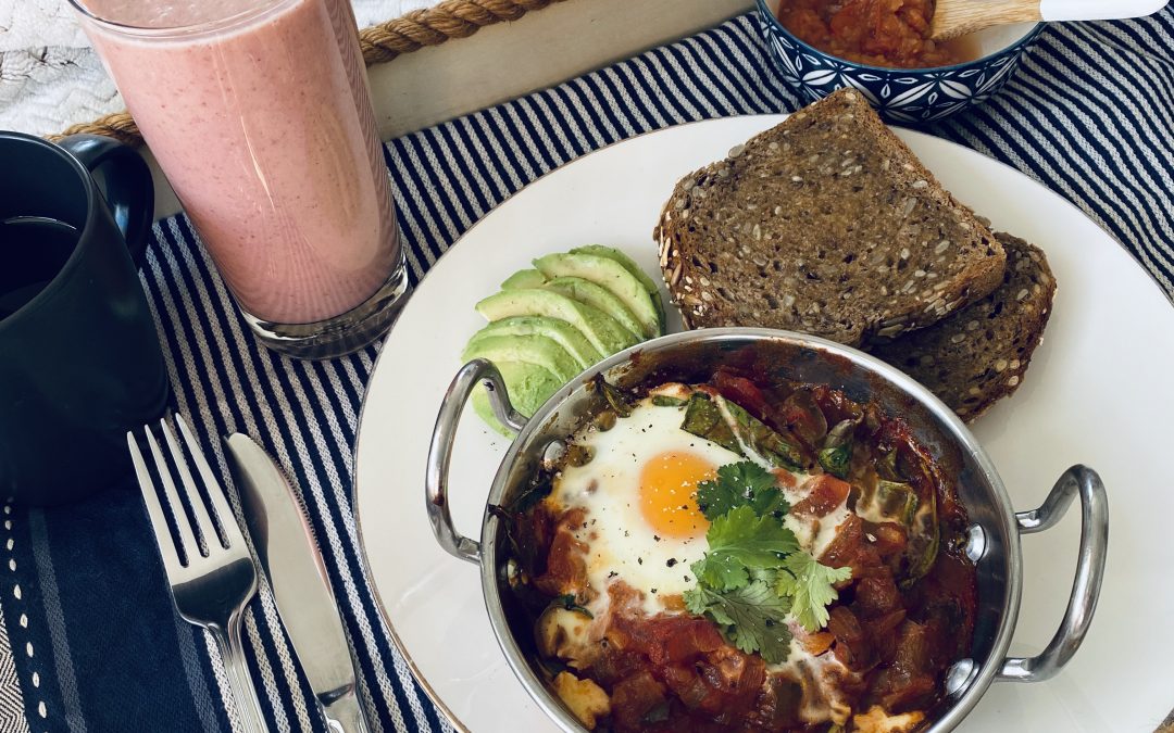 Shakshuka (Baked Eggs) with a Spiced Relish, served with a Fruity Smoothie