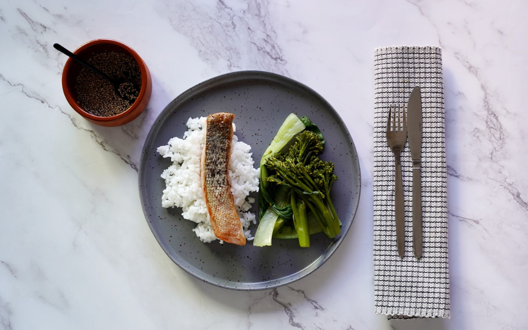 Crispy Skinned Salmon, Steamed Greens with a Sesame and Lime reduction.